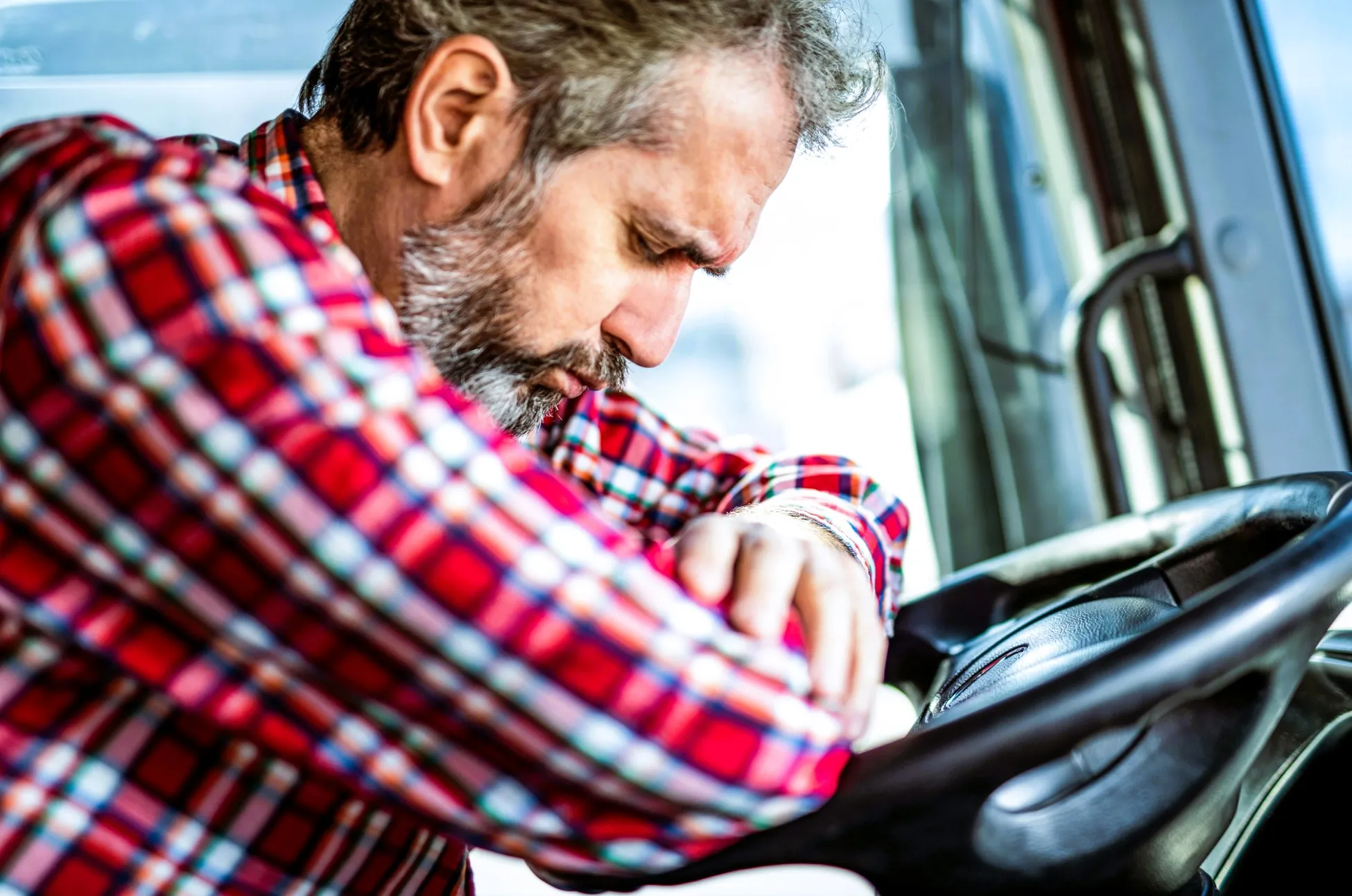 A truck driver with back pain